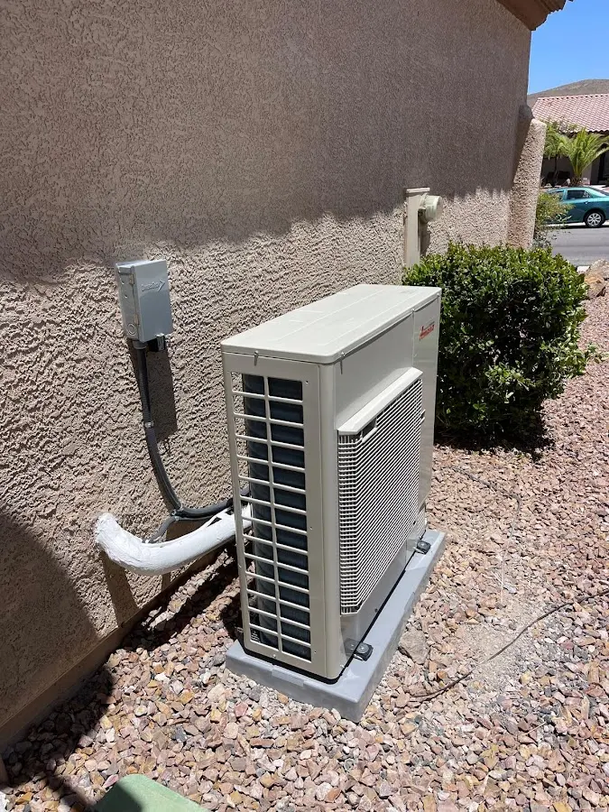 Residential air conditioning condenser unit in Springfield